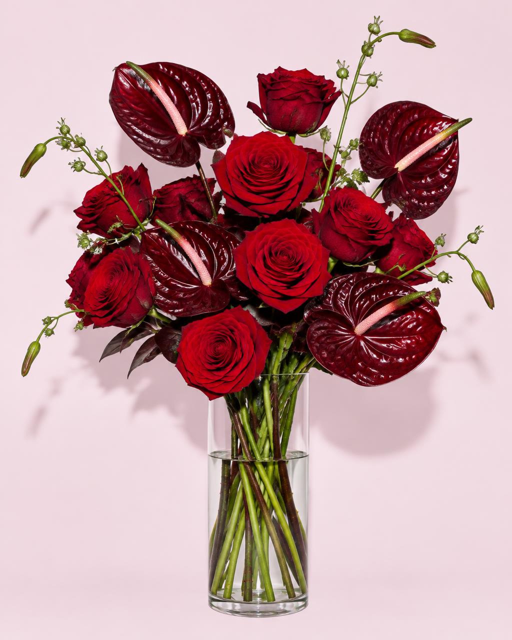 The hopeless romantic floral arrangement in a clear vase